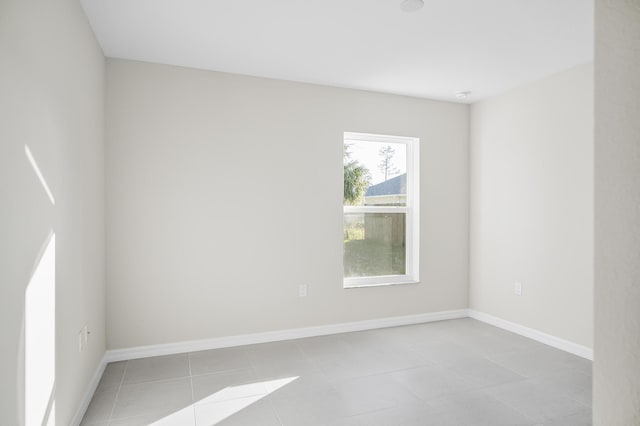 empty room featuring light tile patterned flooring