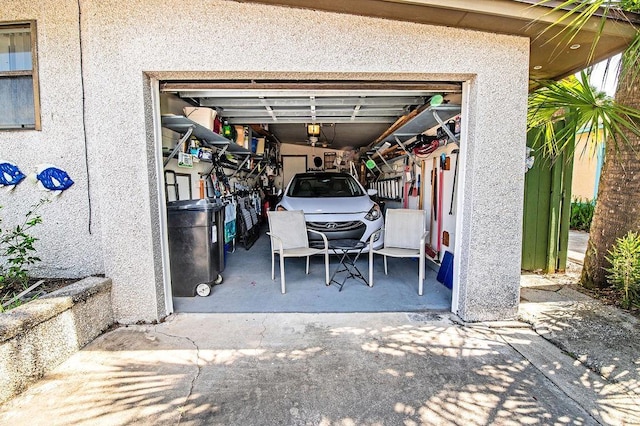 garage featuring a garage door opener