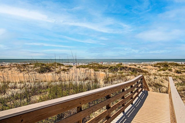 view of community featuring a view of the beach and a water view