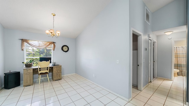 tiled office space with high vaulted ceiling and a chandelier