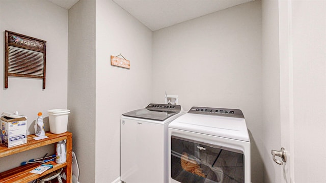 laundry room with independent washer and dryer