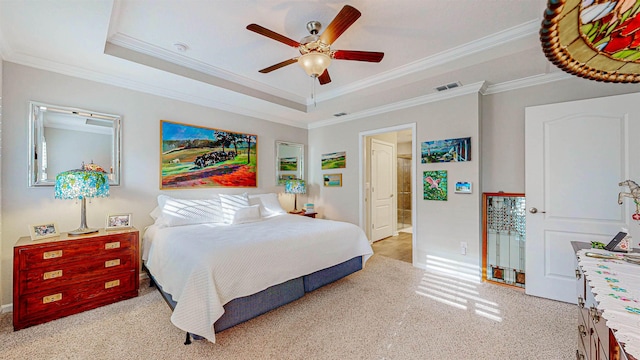 bedroom featuring crown molding, ceiling fan, and a raised ceiling