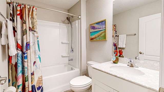 full bathroom featuring vanity, a textured ceiling, toilet, and shower / bath combo with shower curtain