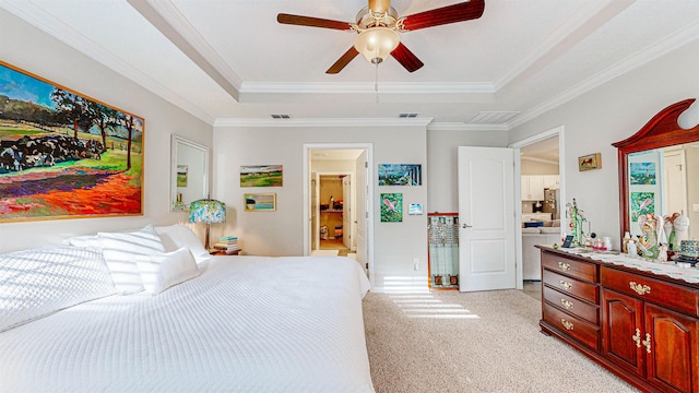 bedroom featuring crown molding, ceiling fan, a raised ceiling, and light carpet