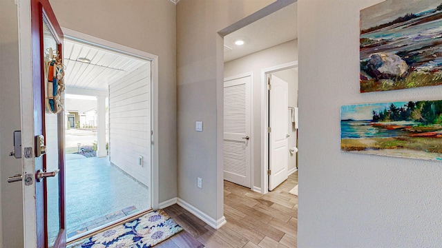 entrance foyer with light wood-type flooring