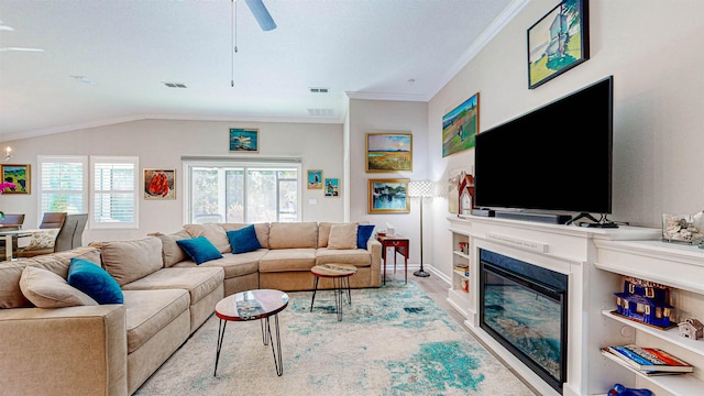 living room featuring lofted ceiling, crown molding, light hardwood / wood-style flooring, and ceiling fan