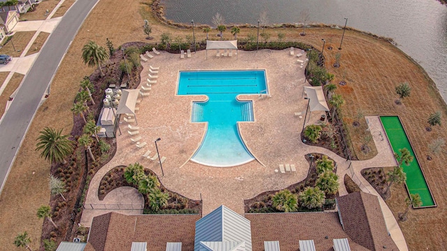 view of swimming pool featuring a patio