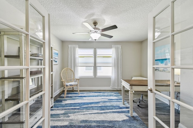 100 Dove Tree Ln, Saint Augustine, FL 32095 - office with ceiling fan, a textured ceiling, and wood finished floors