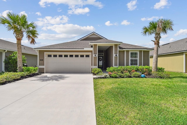 100 Dove Tree Ln, Saint Augustine, FL 32095 - ranch-style home featuring a garage, driveway, and a front lawn