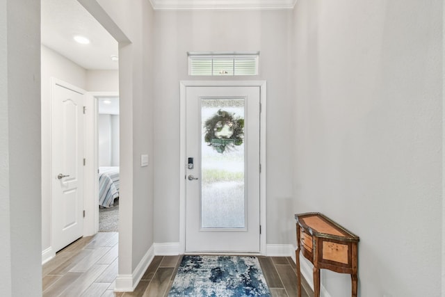100 Dove Tree Ln, Saint Augustine, FL 32095 - foyer with wood finish floors and crown molding