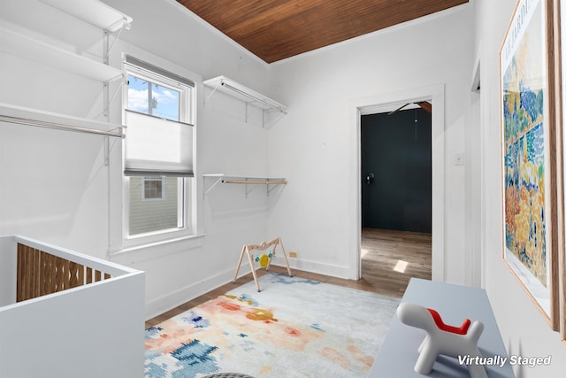 spacious closet with wood finished floors