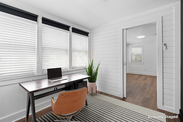 office area with vaulted ceiling and wood finished floors