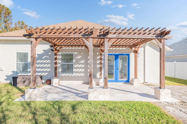 back of house with french doors, a pergola, and a patio