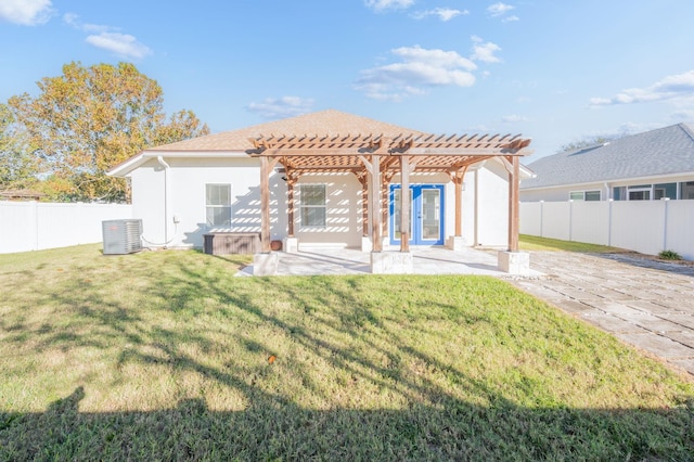 rear view of house featuring a pergola, a patio area, a lawn, and cooling unit