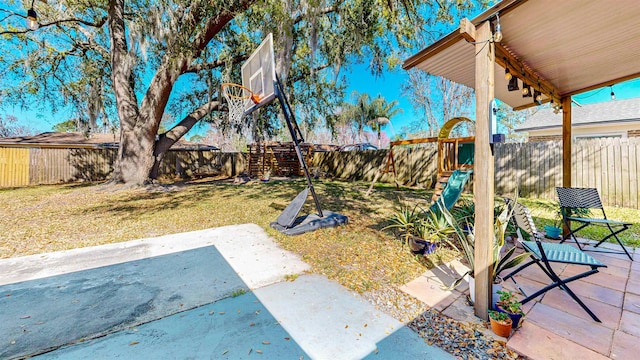 view of yard featuring a fenced backyard and a patio