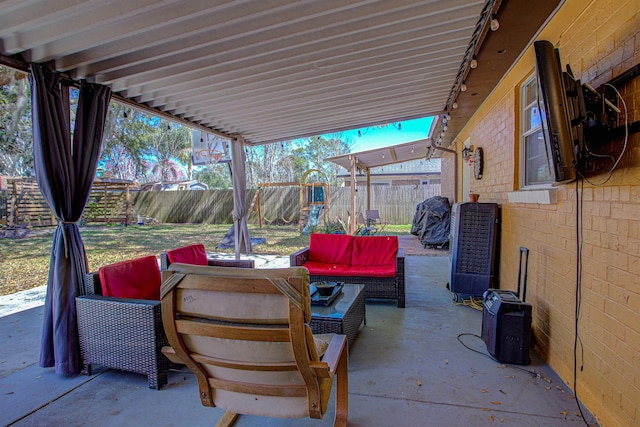 view of patio with an outdoor hangout area and a fenced backyard