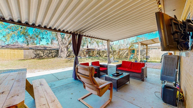 view of patio with a fenced backyard and an outdoor living space