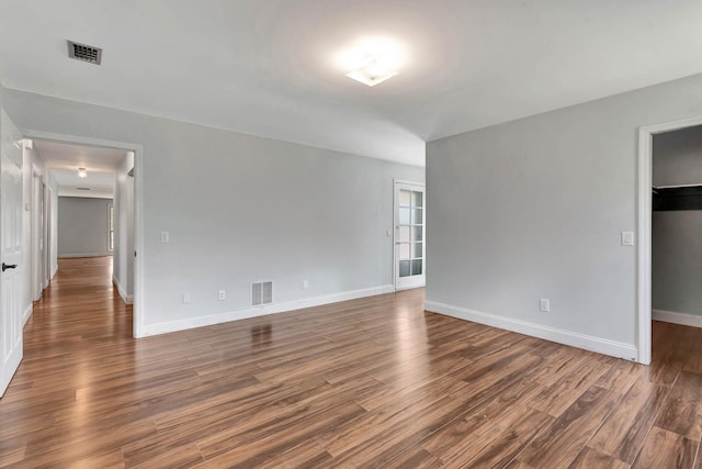 132 Southwind Cir, Saint Augustine, FL 32080 - empty room with wood finished floors and baseboards