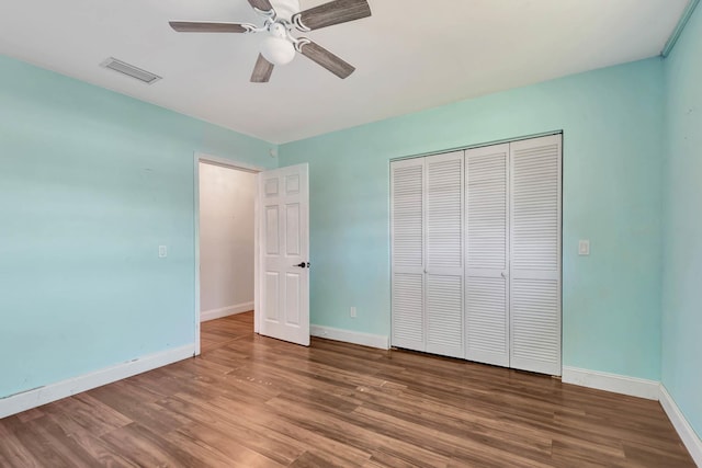 132 Southwind Cir, Saint Augustine, FL 32080 - unfurnished bedroom featuring wood finished floors, a closet, and ceiling fan