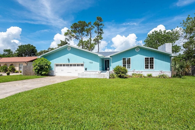 132 Southwind Cir, Saint Augustine, FL 32080 - ranch-style home with a chimney, a garage, a front lawn, and concrete driveway