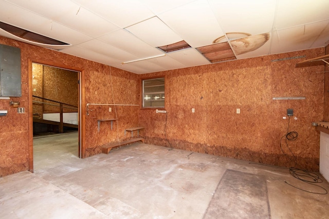 132 Southwind Cir, Saint Augustine, FL 32080 - spare room featuring unfinished concrete floors and a paneled ceiling