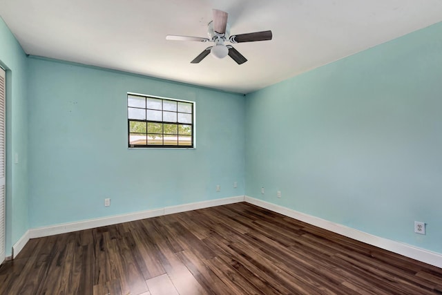 132 Southwind Cir, Saint Augustine, FL 32080 - empty room with dark wood-type flooring and a ceiling fan