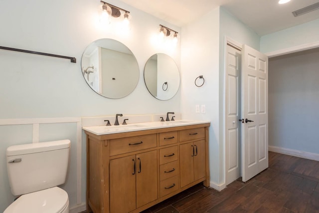 132 Southwind Cir, Saint Augustine, FL 32080 - bathroom featuring wood finished floors and double vanity