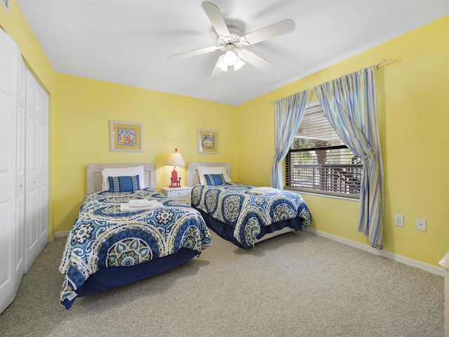 4250 A1A S L25, Saint Augustine, FL 32080 - bedroom featuring carpet flooring, a closet, baseboards, and ceiling fan
