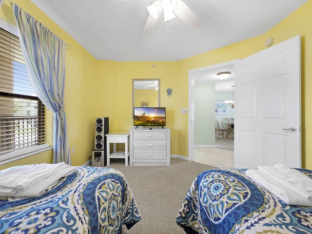 4250 A1A S L25, Saint Augustine, FL 32080 - bedroom featuring carpet floors, a ceiling fan, and baseboards