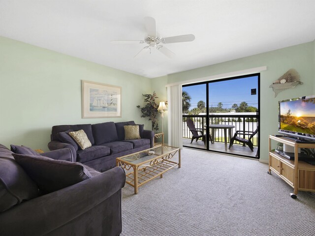 4250 A1A S L25, Saint Augustine, FL 32080 - living room featuring a ceiling fan and carpet flooring