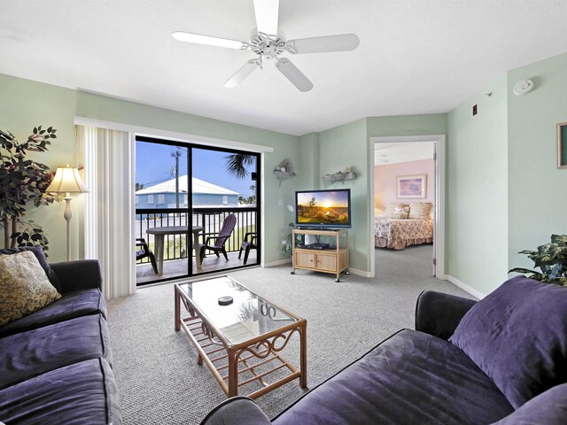 4250 A1A S L25, Saint Augustine, FL 32080 - carpeted living area with ceiling fan and baseboards