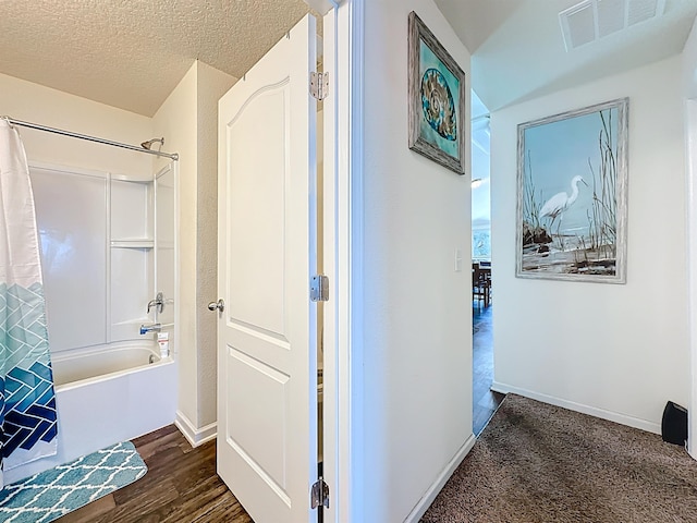 348 Ashby Landing Way, Saint Augustine, FL 32086 - corridor featuring dark wood-type flooring and a textured ceiling