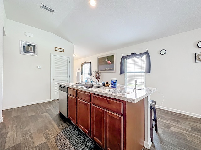 348 Ashby Landing Way, Saint Augustine, FL 32086 - kitchen with vaulted ceiling, dishwasher, a kitchen island, dark wood-style flooring, and light countertops