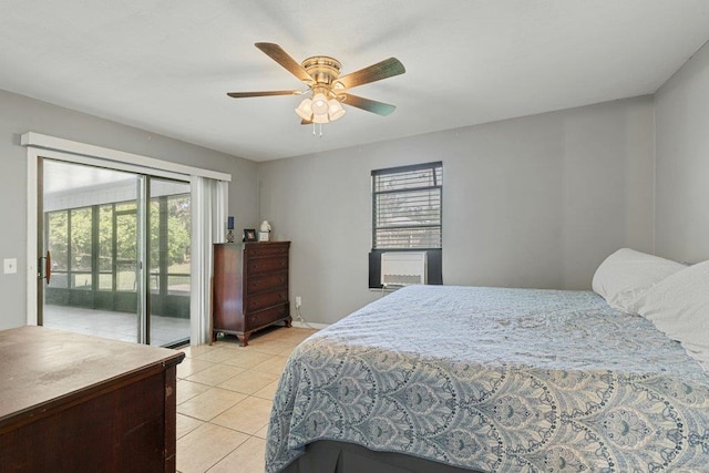 bedroom featuring access to outside, multiple windows, light tile patterned floors, and cooling unit