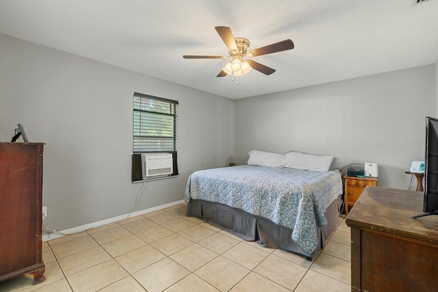 bedroom featuring light tile patterned floors, baseboards, cooling unit, and ceiling fan