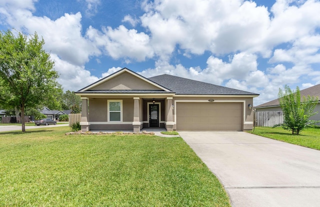 view of front of house with a garage and a front yard