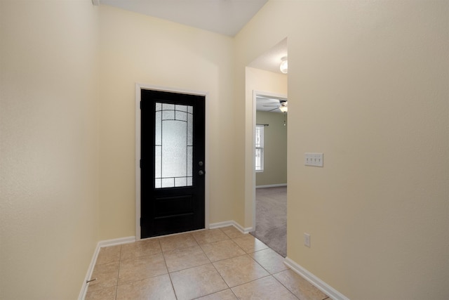 entrance foyer featuring light tile patterned floors