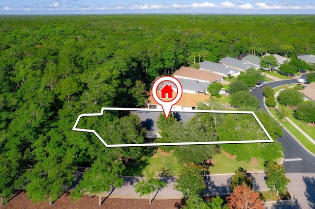 501 Olympic Cir, Saint Augustine, FL 32092 - aerial view of property's location featuring a heavily wooded area and property parcel outlined