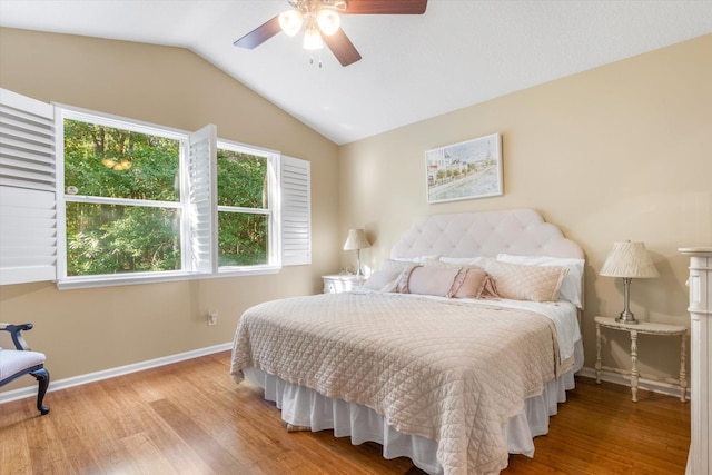 501 Olympic Cir, Saint Augustine, FL 32092 - bedroom with wood finished floors, lofted ceiling, and ceiling fan