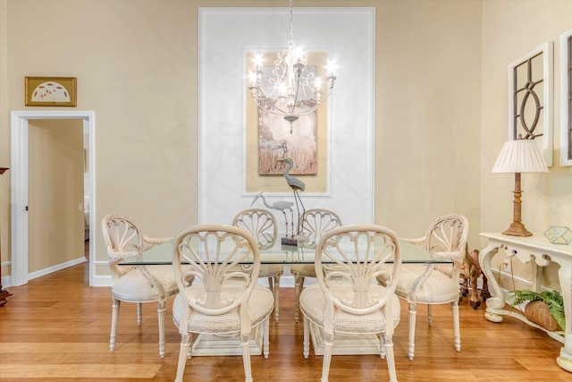 501 Olympic Cir, Saint Augustine, FL 32092 - dining room with a chandelier and wood finished floors
