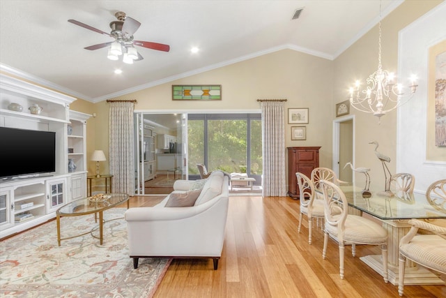 501 Olympic Cir, Saint Augustine, FL 32092 - living room with ceiling fan, wood finished floors, high vaulted ceiling, a chandelier, and crown molding