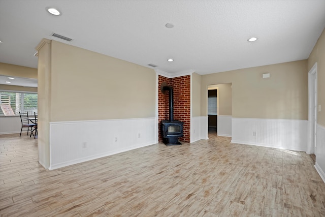 unfurnished living room featuring light wood-type flooring