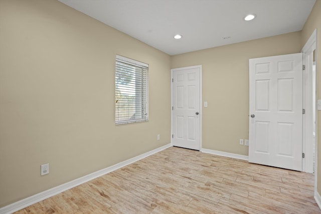 unfurnished bedroom featuring light hardwood / wood-style floors