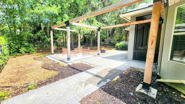 view of patio featuring fence