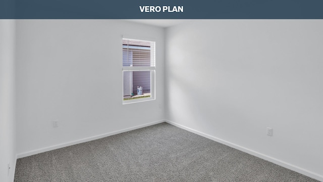 empty room with carpet flooring