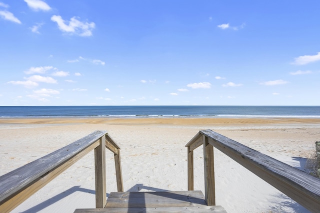 property view of water featuring a beach view