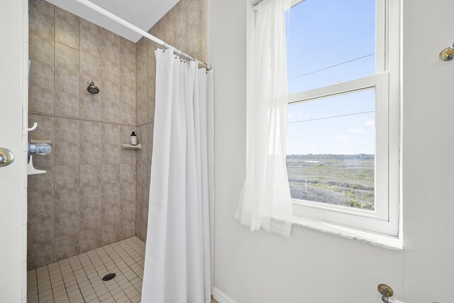 bathroom featuring a stall shower