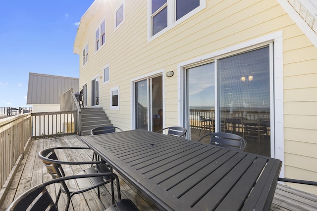 wooden deck with outdoor dining area