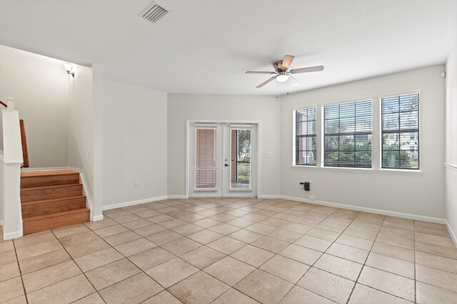 4515 Serena Cir, Saint Augustine, FL 32084 - spare room with ceiling fan, visible vents, a healthy amount of sunlight, and stairway