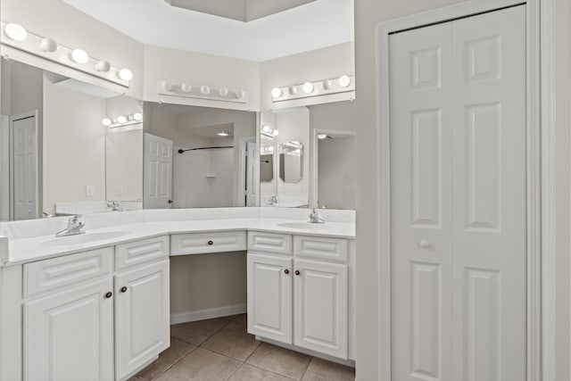 4515 Serena Cir, Saint Augustine, FL 32084 - full bathroom with tile patterned floors, a sink, double vanity, and a closet